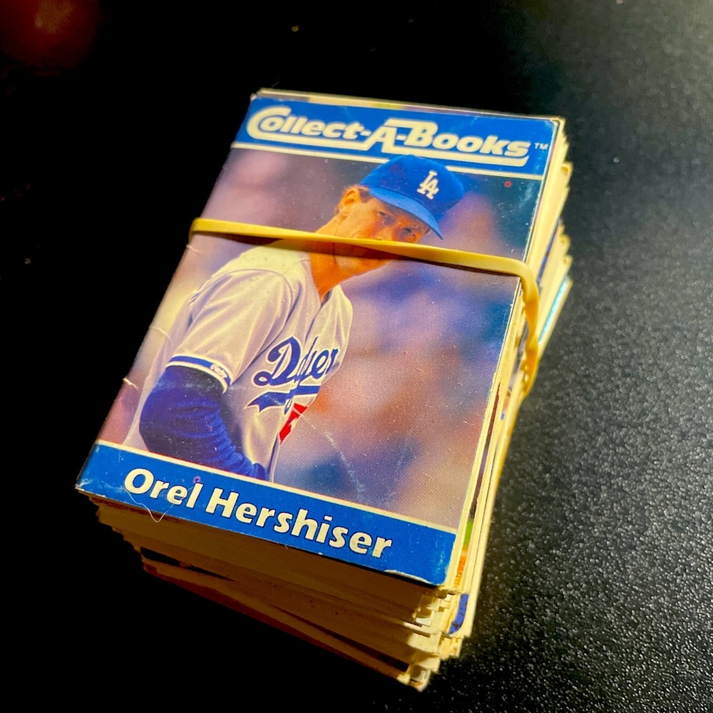 Stack of Baseball, Basketball, and Hockey Cards